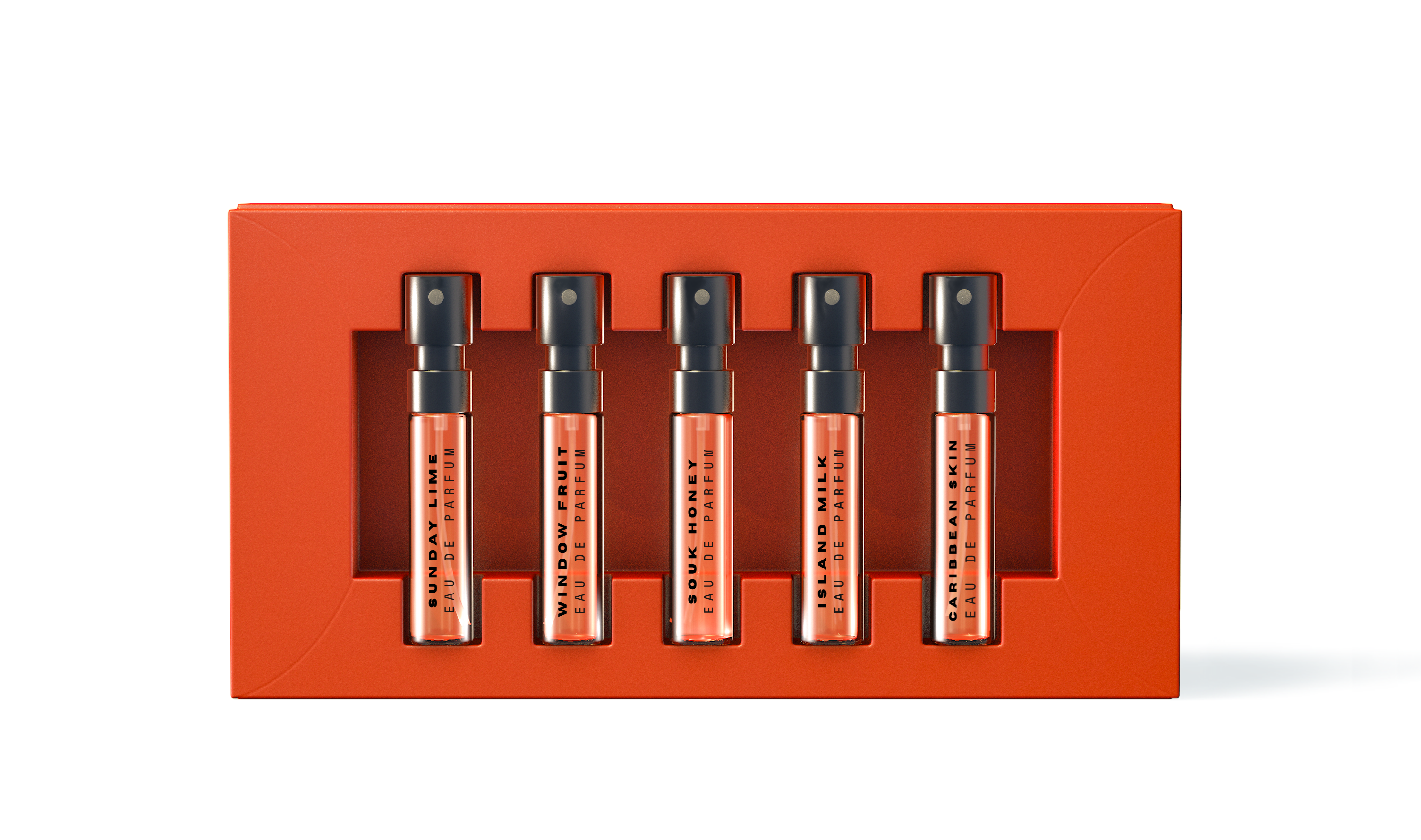 Set of five small bottles with black caps in a red display box on a white background