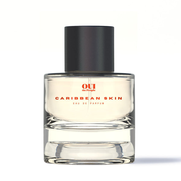 Perfume bottle labeled Caribbean Skin' on a white background