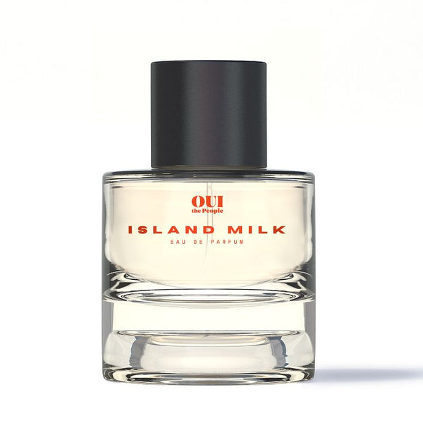 Perfume bottle labeled Island Milk on a white background