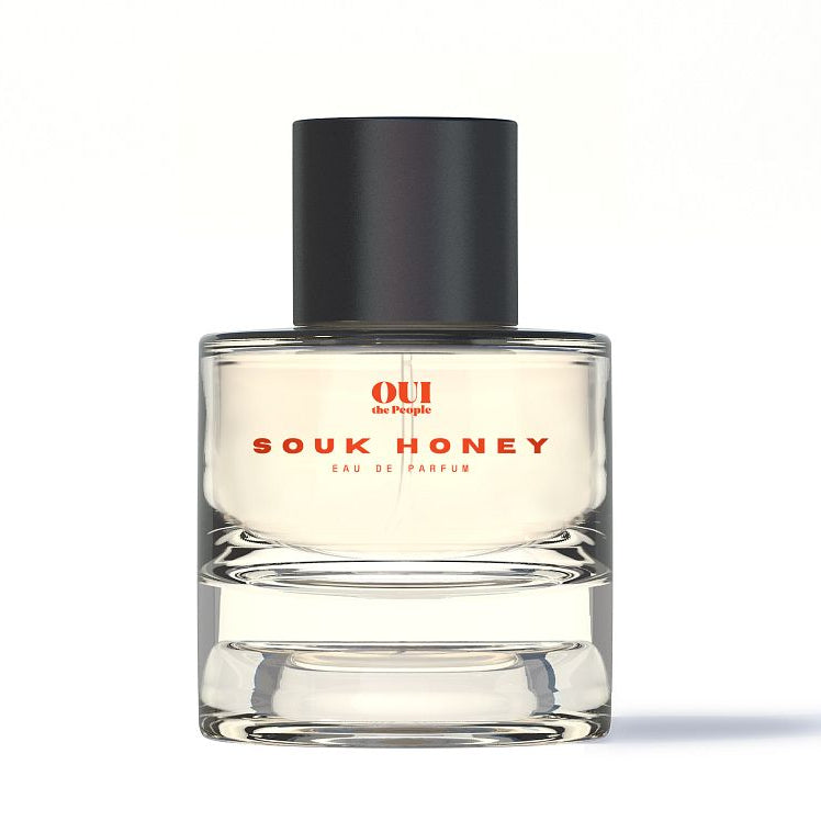 Clear bottle with black lid on white background